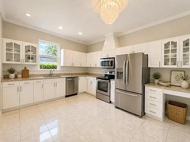 Photo - Waterfront Luxury Living | Sunset Views + 5BR + 3-Car Garage