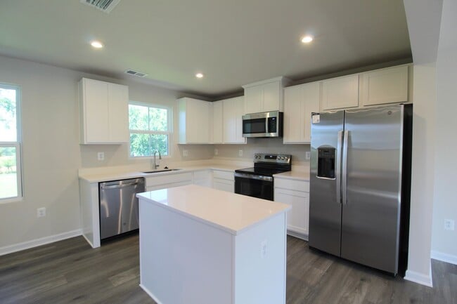 Photo - Never-Lived-In Luxury: Modern 3-Level Living + Garage in Orchard Ridge