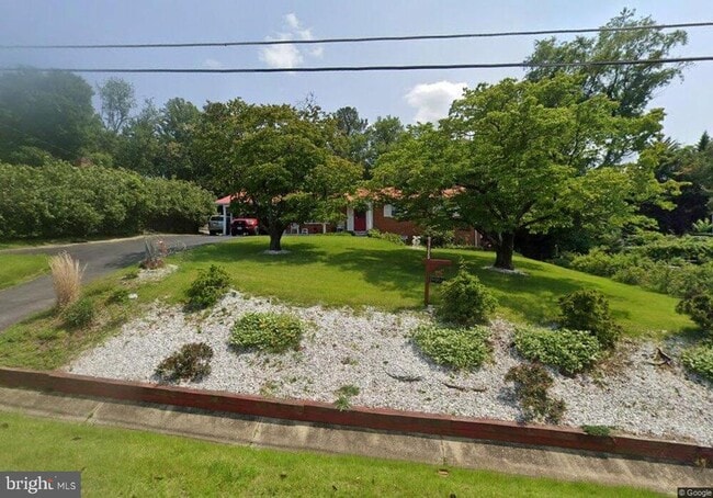 Building Photo - 7705 Earnshaw Dr Rental