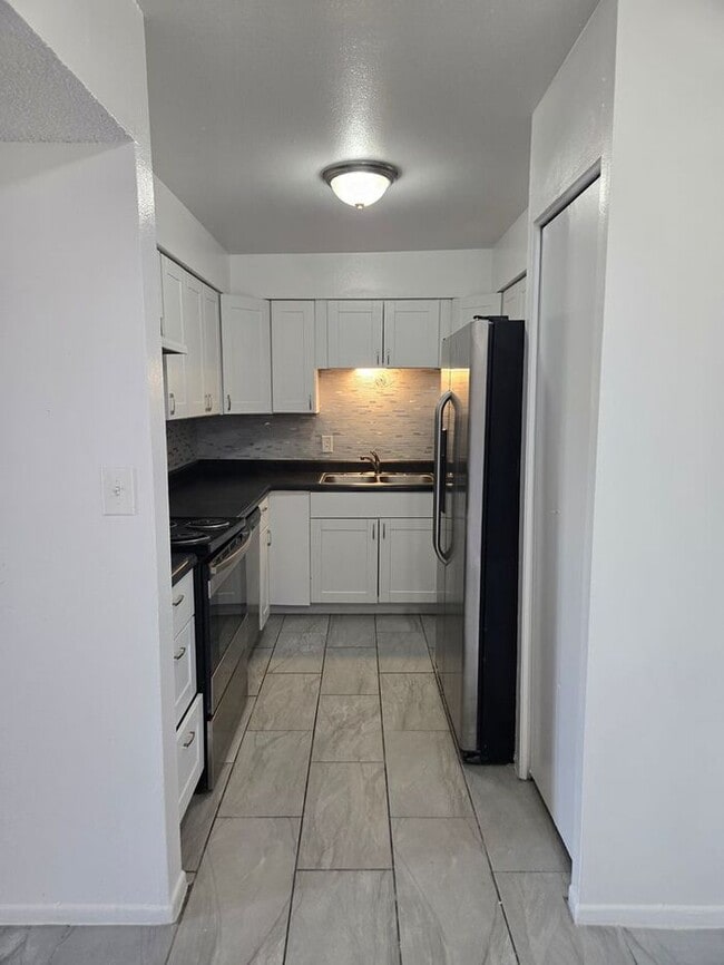 Photo - Spacious 3 bed, 2 bath upstairs, condo in ...