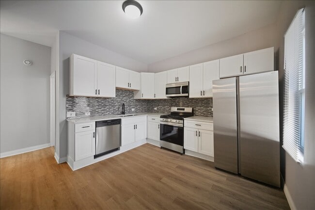 Photo - 3002 E 81st St Unidad 2