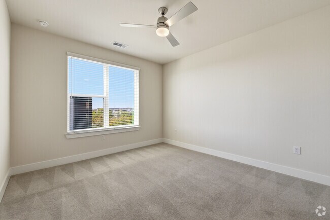 2BR, 2BA - 1,179SF - Primary Bedroom