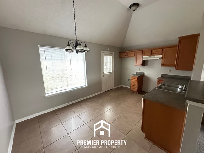 Photo - Cozy 3-Bedroom Memphis Rental with Brick Fireplace, High Ceilings & Fenced Yard