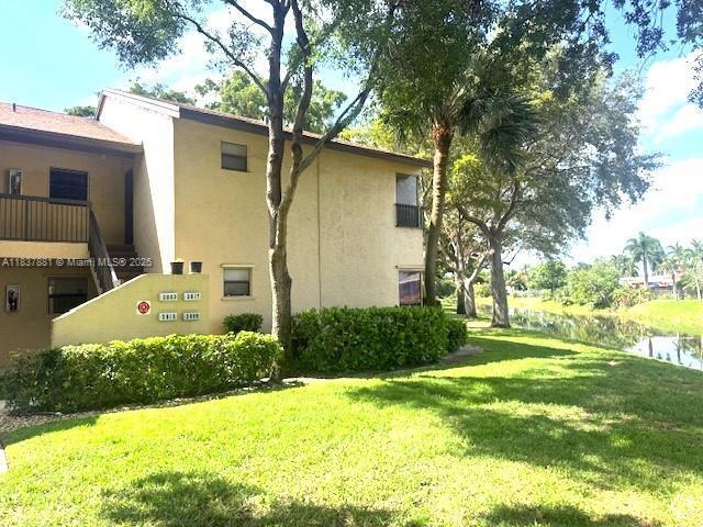 Building Photo - 3817 Cocoplum Cir Unit 3585 Rental