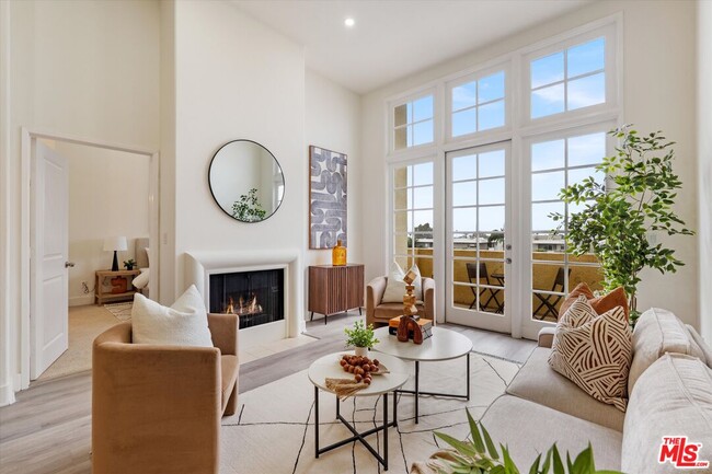 Building Photo - 1225 Armacost Ave Unit 304