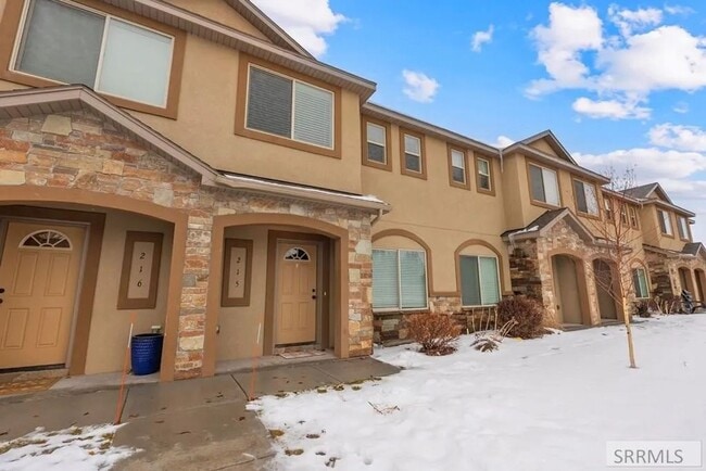 Building Photo - Beautiful 3-Bed, 2.5-Bath Rock Creek Townhome with Attached 2-Car Garage