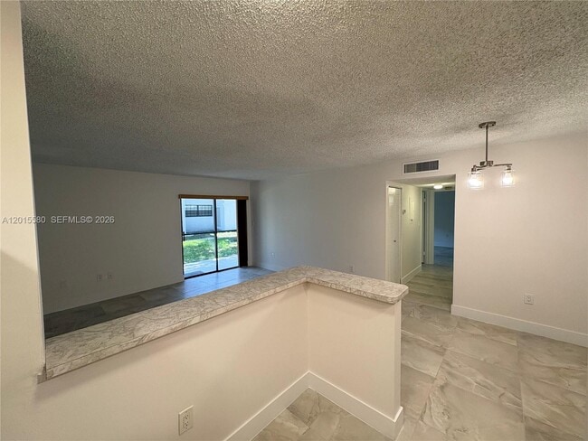 Photo - 18875 NW 62nd Ave Unit 105