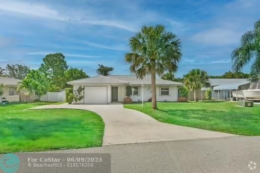 Building Photo - 6159 SE Poinciana Ln Rental
