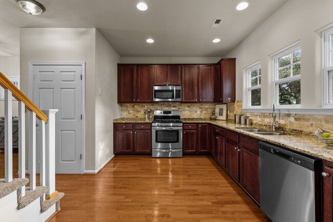 Photo - Welcome to this stunning 3-bedroom, 3.5-bath tri-level condo!
