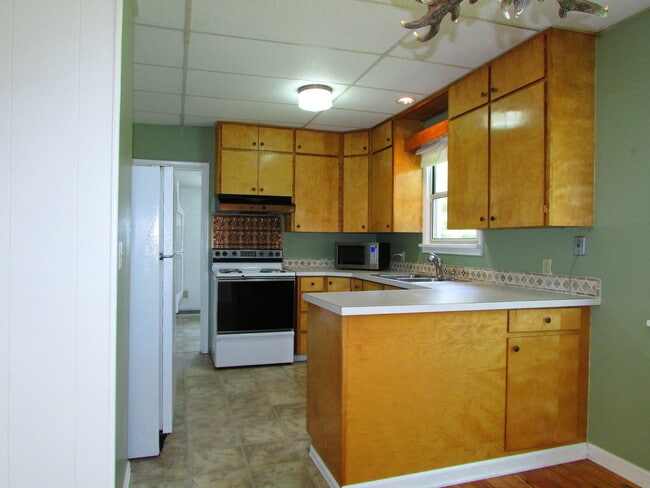 Photo - Beautiful Home with a Garage and Partially Fenced Yard