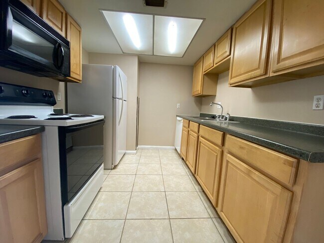 Photo - 2 Bedroom, 1.5 Bath Second Floor Condo in ...