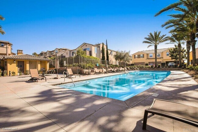 Photo - Stylish Three-Story Townhome with Private Courtyard & Pool Access