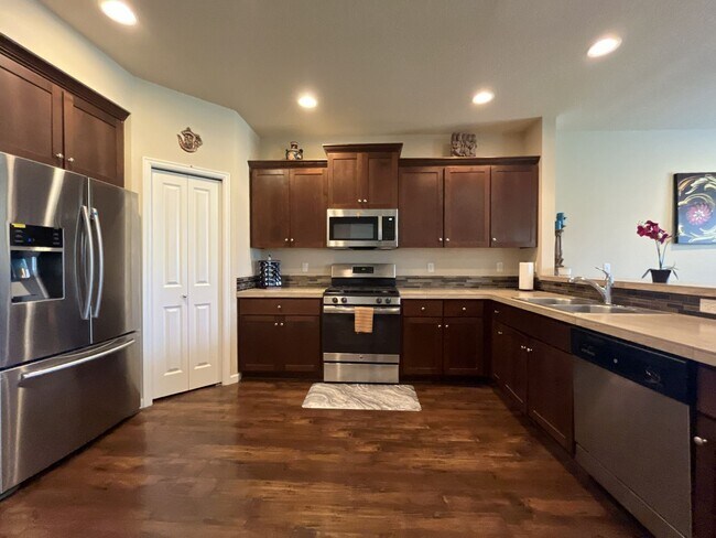 Photo - Stunning 4 Bedroom + Loft Bethany Home with Open Layout, Stainless Steel Kitchen, Two Car Garage ...