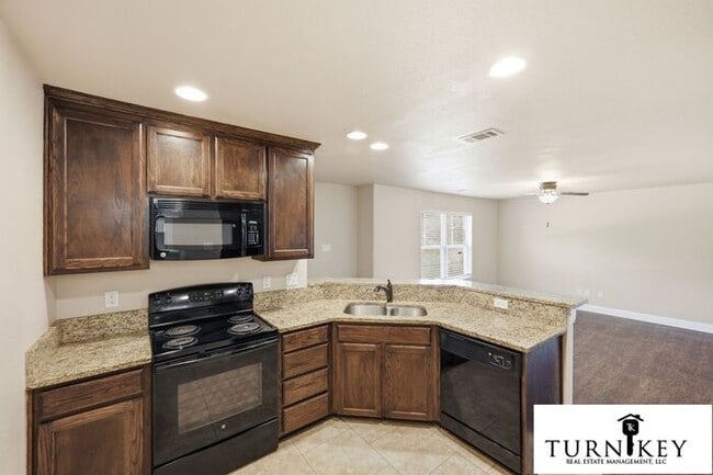 Photo - Move In Ready | 3BR/2BA Weatherford Town Home with Granite Countertops, Luxury Plank Floors & App...