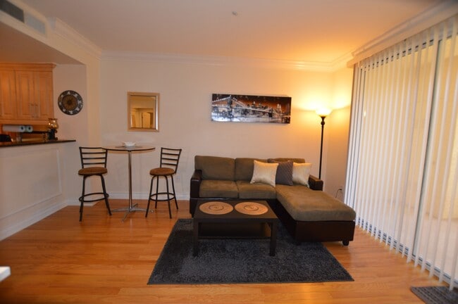 Building Photo - Meridian Furnished 1 Bed | 1 Bath Studio Luxury Condo with Partial Strip View