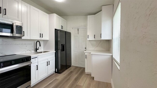 Building Photo - 550 NW 15th Ct Rental