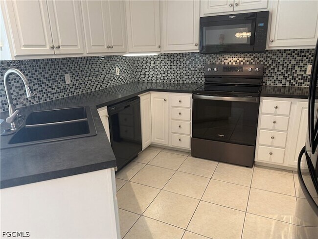 Building Photo - 7400 College Pkwy Unit 1D