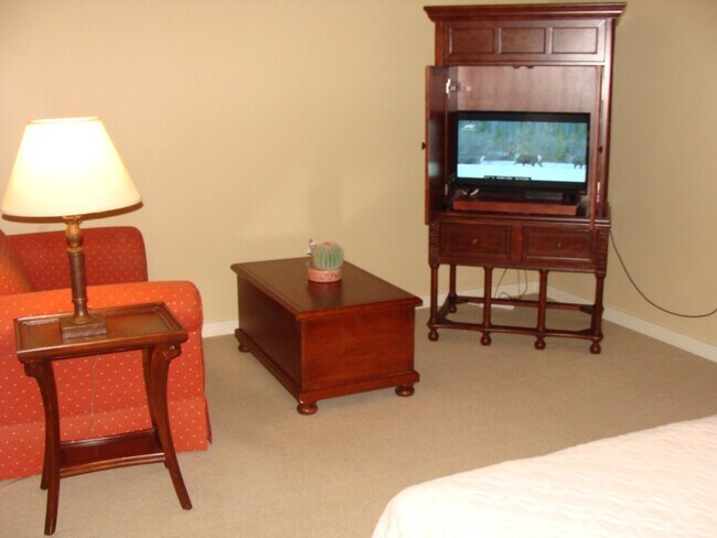 Photo - 1-bedroom furnished condo with fenced courtyard