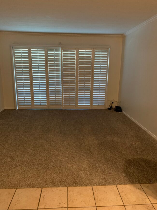 Living room brand new carpet and paint Sliding doors to deck - 436 N Bellflower Blvd Unidad 218 Rental