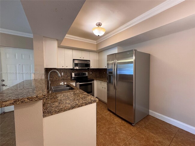 Photo - 5640 NW 61st St Condo Unit 1411