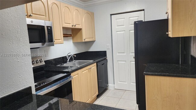 Photo - 10785 SW 108th Ave Unit 105