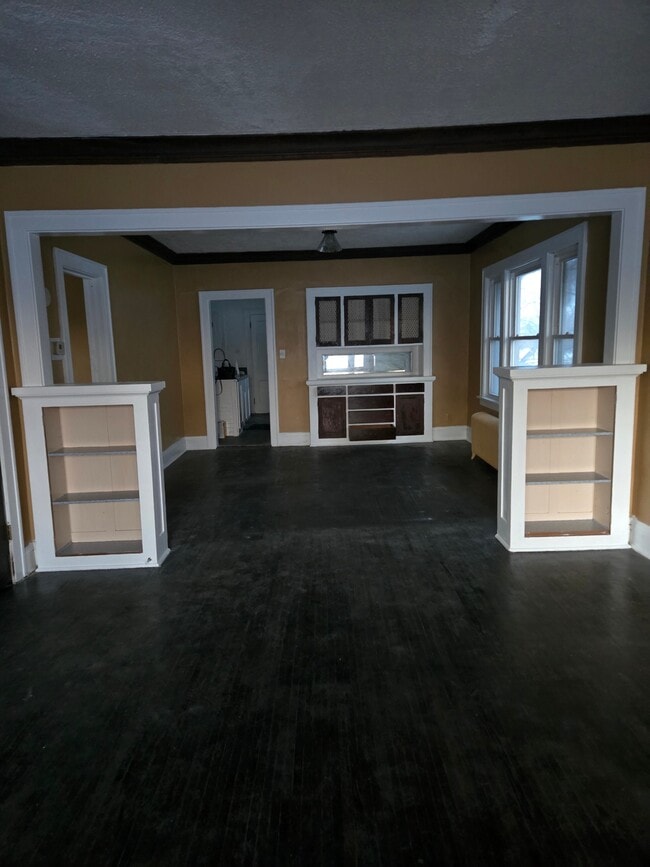 Built in Bookcases and Buffet in the Living Room and Dining Room - 716 Elwood Ave N Unit Upper Level