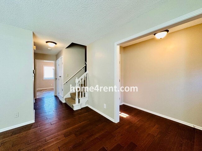 Photo - Beautiful Overland Park Townhome w/ Wood Floors, Large Open Kitchen and a Community Pool!