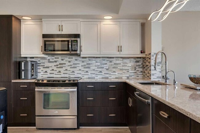 Photo - 1100 8 Av SW Unit 1906