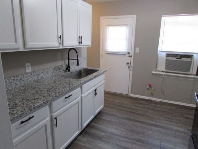 Photo - Comfortable 2BD/1BA Apartment with Washer/Dryer Hookups