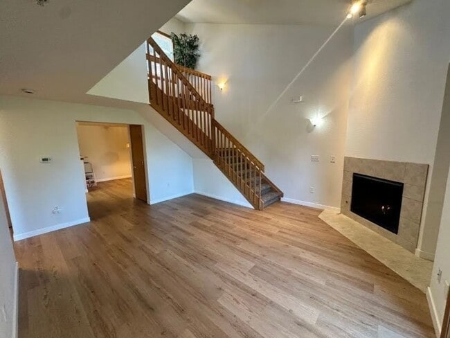 Building Photo - Stylish 3rd Level, Private 2 bedroom Apartment With LVP Flooring, Decks, Gas Fireplace & In-Unit ... Unit 302