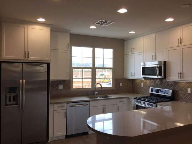 Photo - Amazing 4 Bedroom/3.5 Bathroom Townhome