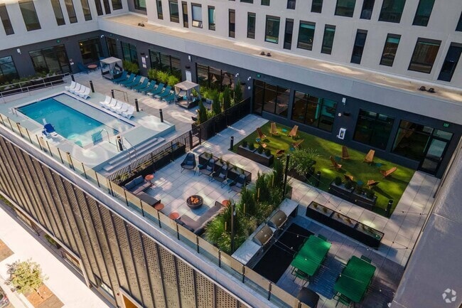 Enjoy poolside relaxation or gather around the fire pit. - Windsor 3000 Huron Rental