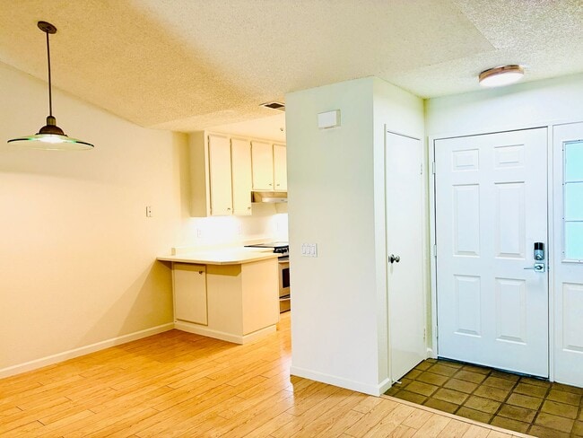 Photo - House like 2bed/1.5 Bath Condo with Spacious Corner Yard and 2 Car Garage