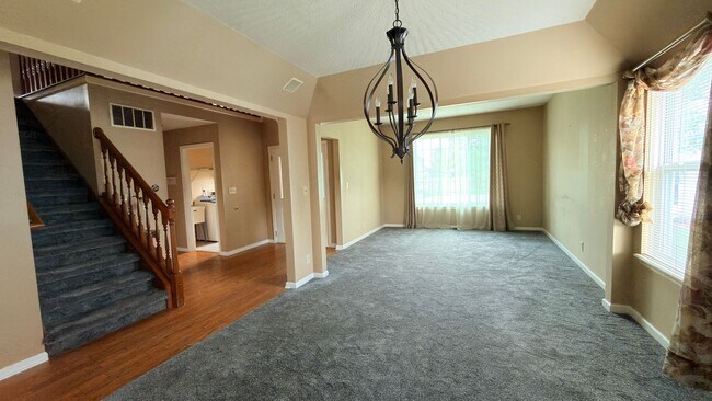 Photo - Spacious 3-Bedroom Home with 3-Car Garage & Large Fenced Backyard!