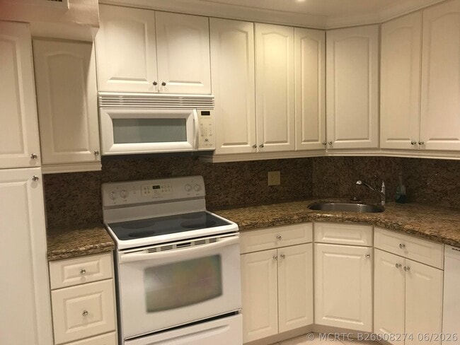 Building Photo - 3300 Spanish Moss Terrace Unit 103
