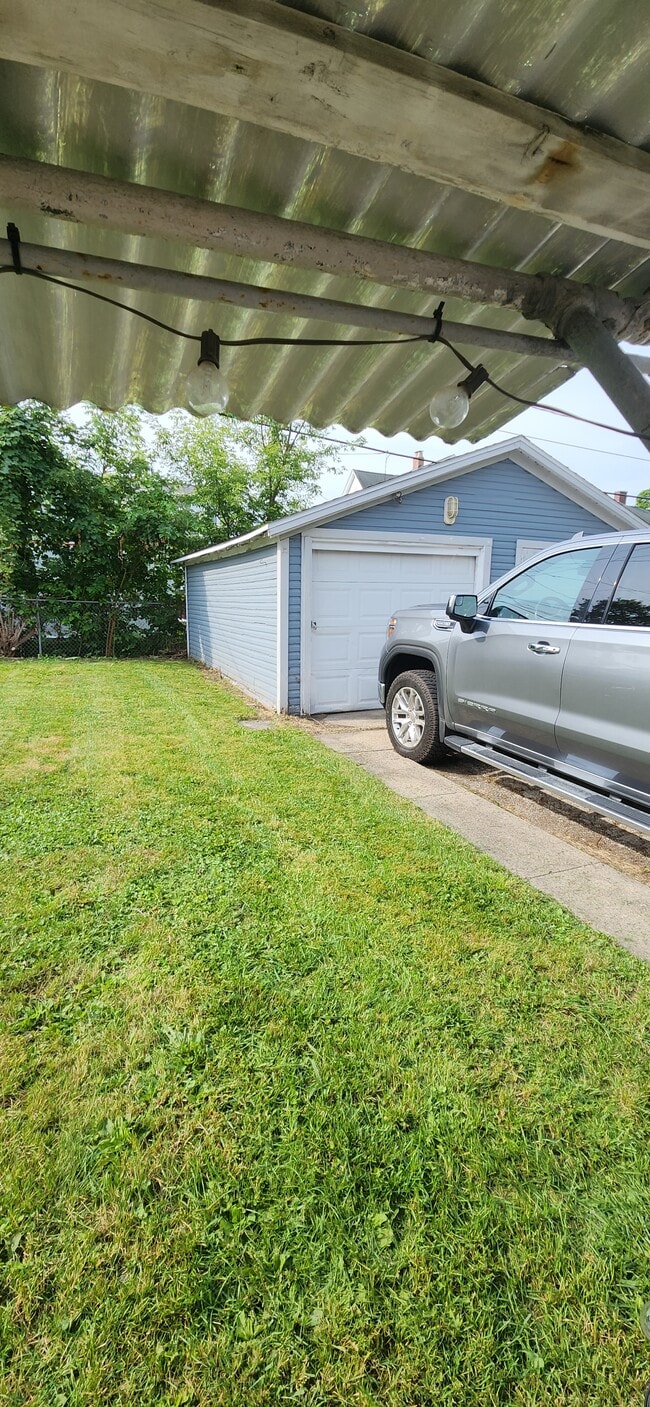 1 car garage - 104 E 2nd St