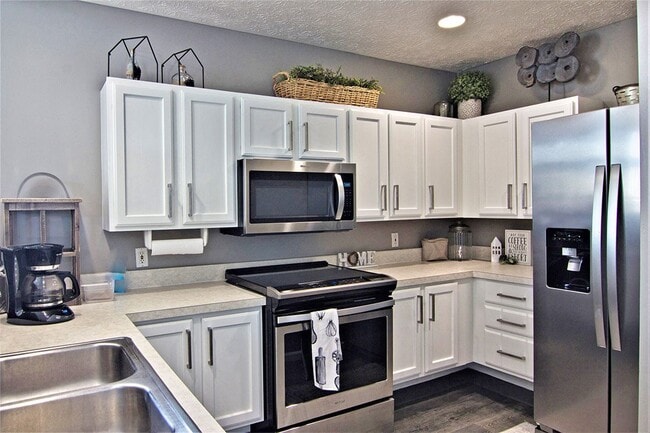 White shaker cabinetry with Brushed Nickel Hardware*