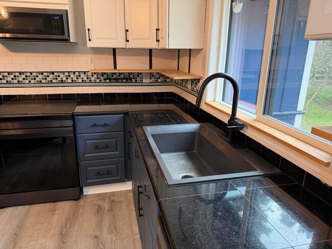 Photo - Lovely Single Level Rambler with Custom Finishes and Pet Friendly!