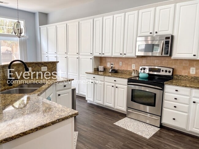 Photo - 4 Bed, 2.5 Bath Home with Garage / Pet-Friendly / Available Soon!