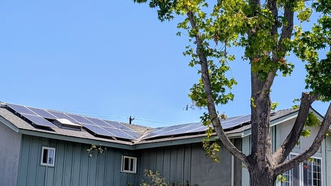 Photo - 2 stories - 4 Bedrooms + 2.5 Baths.  Swimming Pool + Solar Panels !!