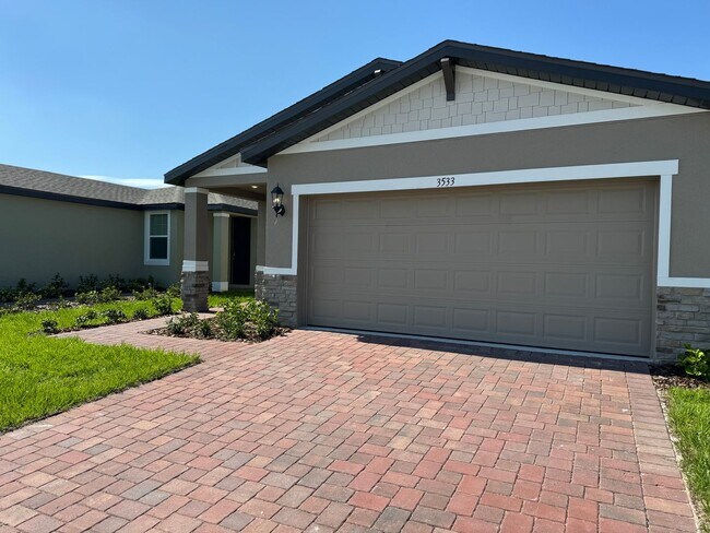 Photo - 3 Bedroom 2 Bath with Double Car Garage in Poinciana!