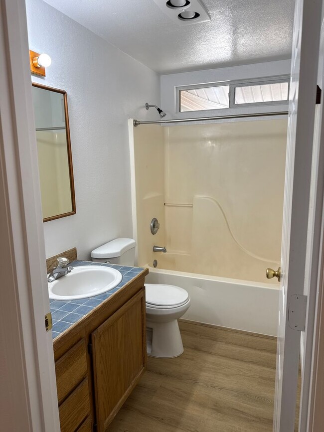 Photo - SE Home on Large Lot, New Luxury Vinyl Flooring & Paint, RV parking, Air Conditioning & Fenced