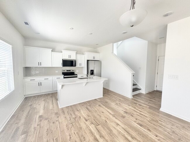 Photo - Four bedrooms with 2 1/2 bath with office space and loft