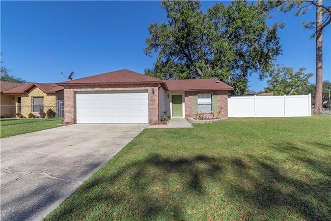 Photo - Freshly Painted 3/2 with Fenced Yard & Fireplace!