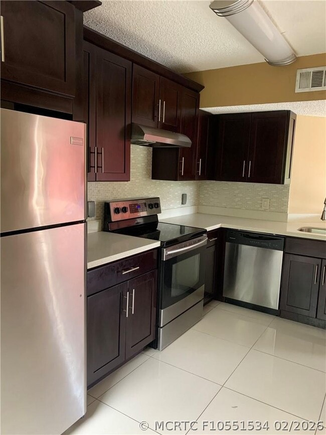 Photo - 8891 Wiles Rd Unit 308