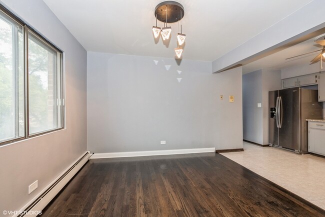 Photo - 7755 S Roberts Rd Condo Unit 5