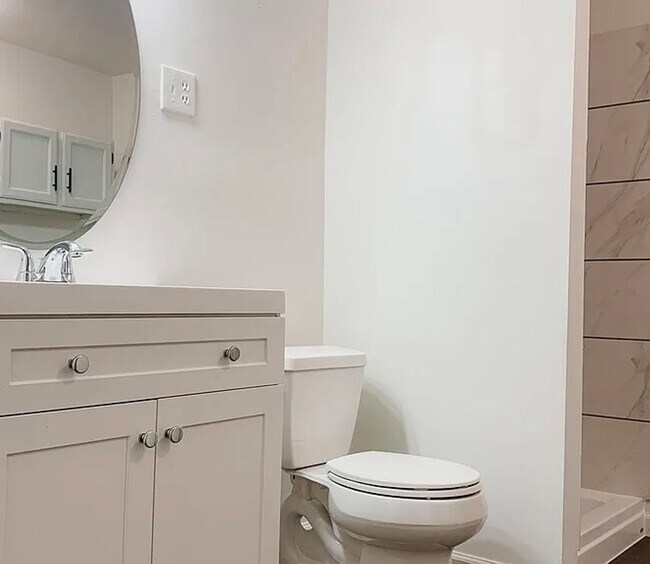 Photo - 4BR Tri-Level with Sunroom & Oversized Fenced Yard & 2-Car Garage!