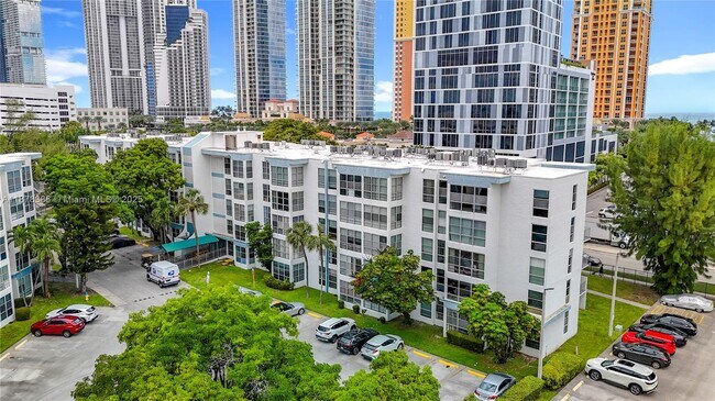 Building Photo - 17620 Atlantic Blvd Unit 505