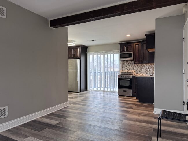 Open floorplan with kitchen and living room
