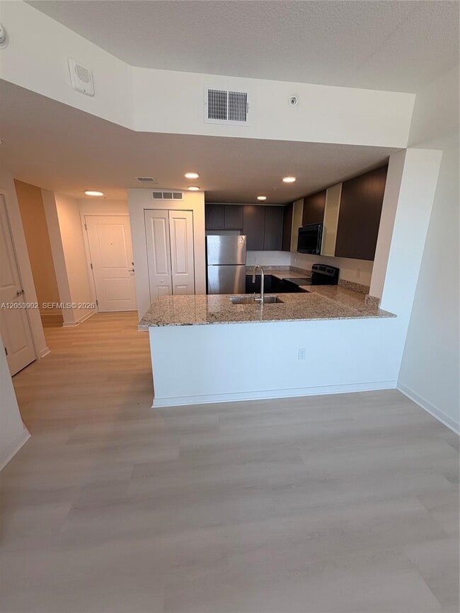 Building Photo - 5563 Millennia Park Dr Unit 212